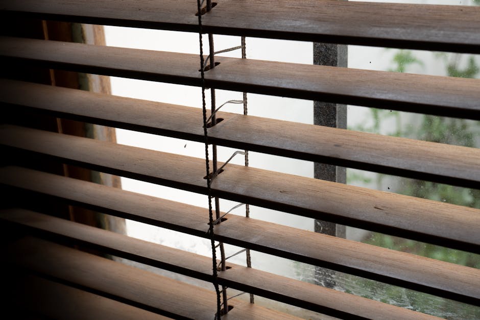 Elegant wooden window blinds in a modern study