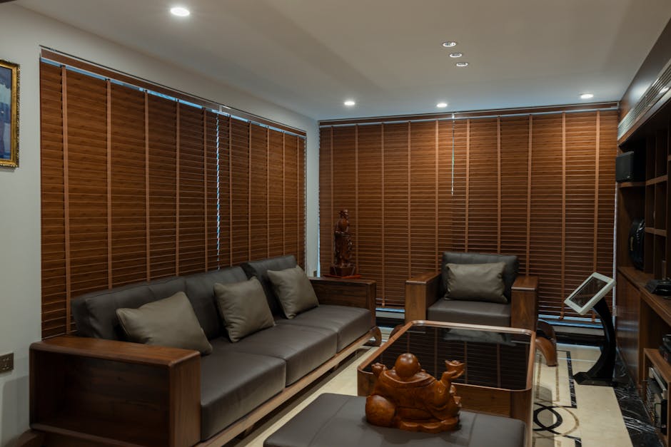 Modern living room with custom window blinds allowing soft natural light